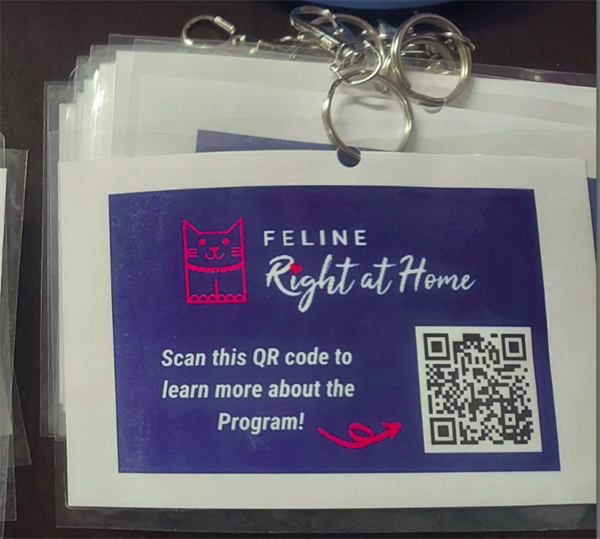 The feline right at home program tag with QR code